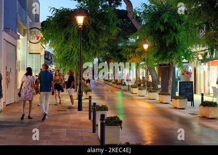 Shopping street with stores in Cala d`Or in the evening light, Cala d`Or, Majorca, Mediterranean Sea, Balearic Islands, Spain Stock Photo